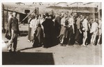 Mauthausen survivors line up for food at the soup kitchen in the 'quarantine camp.'
