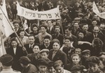 Jewish DPs in the Feldafing displaced persons camp participate in a demonstration calling for a policy of free immigration to Palestine.
