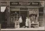 Morris and Chaya Gar Jones in front of their grocery store in New York.
