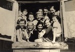 Stella Rein, the headmaster of the Lodz ghetto's high-school, posing with young girls.
