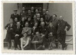 Group portrait of the employees of the "sorting" workshop in the Lodz ghetto, directed by Aron Pruszynowski.