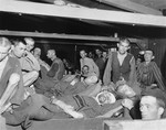 Survivors in the "infirmary" of the Linz concentration camp on the day of their liberation.