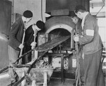 Members of the French resistance inspect the crematorium furnace in Natzweiler-Struthof.