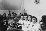 Four brides celebrate their joint wedding in the Foehrenwald displaced persons camp.