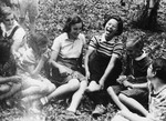 A group of girls enjoy a laugh on the grounds of Chateau de la Guette.