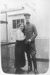 A Jewish soldier in the German army poses in uniform with his young wife.