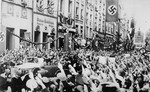 Saluting Germans greet Adolf Hitler during his visit to Danzig.