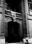 A Nazi banner is draped over the entrance to the city hall in Berlin.