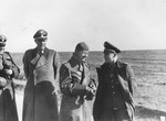 Reichsfuehrer-SS Heinrich Himmler (center) confers with SS and Police Leader Hans Adolf Pruetzmann (extreme left) and Ludolf Herman von Alvensleben (second from the left) during a visit to the Crimea.