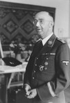 Portrait of Reichsfuehrer-SS Heinrich Himmler on his birthday in his office at SS headquarters in the Hegewald bei Zhitomir compound.