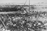 View of the charred remains of Jewish victims burned in a barn by the Germans near the Maly Trostinets concentration camp.