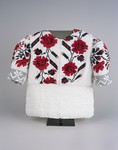A hand-made flowered blouse given to Eve Rich by the nuns of a Carmelite convent after they could no longer hide them.