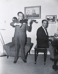 Two Jewish brothers, both musicians, practice a violin-piano duet.