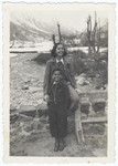 Two Jewish siblings pose outside in the snow in Lyon where they are living in semi-hiding under their own names.