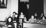 Young students study at an illegal Jewish school run out of a private home in Hilversum, Holland.