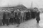 Jewish DPs line up in preparation for an anti-British demonstration at the Ziegenhain displaced persons camp.