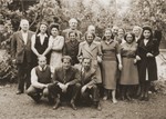 Members of the staff of the Rothschild Hospital pose on the hospital's grounds.