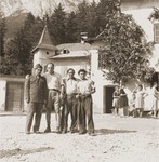 Four Bricha guides pose in the Gnadenwald transit camp, located in the Tyrol mountains, a stopping point on the Bricha route from Austria to Italy.