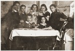 A group of Jewish girls in the Zabno ghetto toast their friend on her twelfth birthday.