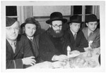 Religious Jews gather for either a Shabbat or a holiday meal in the Zeilsheim displaced persons' camp.