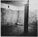 View of a corpse lying on the floor of a crematoria.