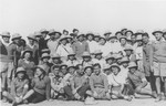 Group portrait of members of the Teheran children's transport during a stopover in Karachi while en route to Palestine.