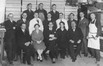 Group portrait of the employees of a business where Cecil Gelbart worked as a chemist.