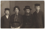 Portrait of an orthodox family in Oswiecim.

Pictured from left to right are Hirsh, Malka, Yehuda and Moshe Krieser.