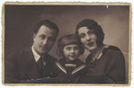 Studio portrait of Salomon, Avram and Rachil Romas, a Lithuanian-Jewish family.