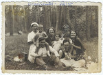 A group of friends and relatives vacations in a summer resort in the woods.