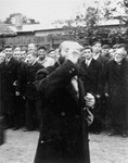 A religious Jew is publicly humiliated in the town square of Raciaz.