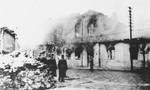 German soldiers view the burning of a synagogue in Siedlce.