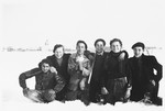 A group of Jewish youth who are living in hiding in the village of Treves, pose in the snow.