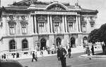 Isaac Margosis, editor of the Yiddishe Woch, stands outside the Grand Theatre in Geneva, the site of the 21st Zionist Congress.