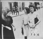 Three young women walk along a street in Bitola.  [Daughters of Haim Nachmias].