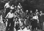 Group portrait of several families in the Feldafing DP camp.
