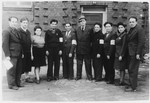 Group portrait of Jewish police in the Vinnhorst DP center.