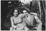 A young Jewish couple who lent assistance to the French Jewish resistance group Armée Juive, pose in the forest.