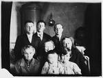 Portrait of the Schneidman and Shpuntov families in their apartment in Leningrad.