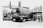 Jewish Brigade soldiers transport Jewish DPs by truck in The Netherlands.