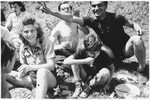 Members of Armée Juive enjoy a picnic in their training camp in the Alps.