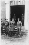 Members of the Jewish Brigade stand at the entrance to their headquarters in The Netherlands.