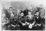 Group portrait of volunteers of the civil guard stationed in Khatnezha, outside of Leningrad.