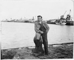 Jewish refugee Arthur Einhorn poses at the port of Cadiz before boarding the SS Nyassa for Palestine.