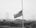 The American flag flying at half mast in Buchenwald.