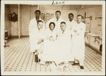 Dr. Leon Gordon (standing in the back, second from left) poses with a group of other medical personal at the surgical clinic in Vilna.