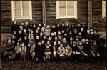 Students of the Tarbut school in Eisiskes. 

The teacher, Mr.