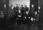 Adolf Hitler poses with members of his first cabinet in the chancellery.