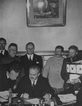 Soviet foreign minister Vyacheslav Molotov signs the Nazi-Soviet Non-Aggression Pact.