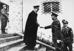 Adolf Hitler greets Ante Pavelic, leader of the Croatian puppet state, upon his arrival at the Berghof for a state visit.